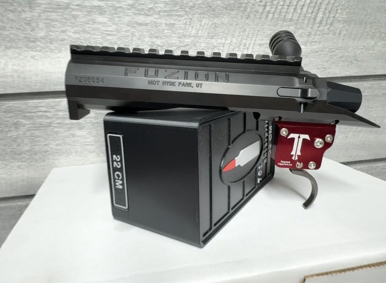 MDT Fuzion short action with TriggerTech Diamond trigger on 701 Enterprises 22 CM display block