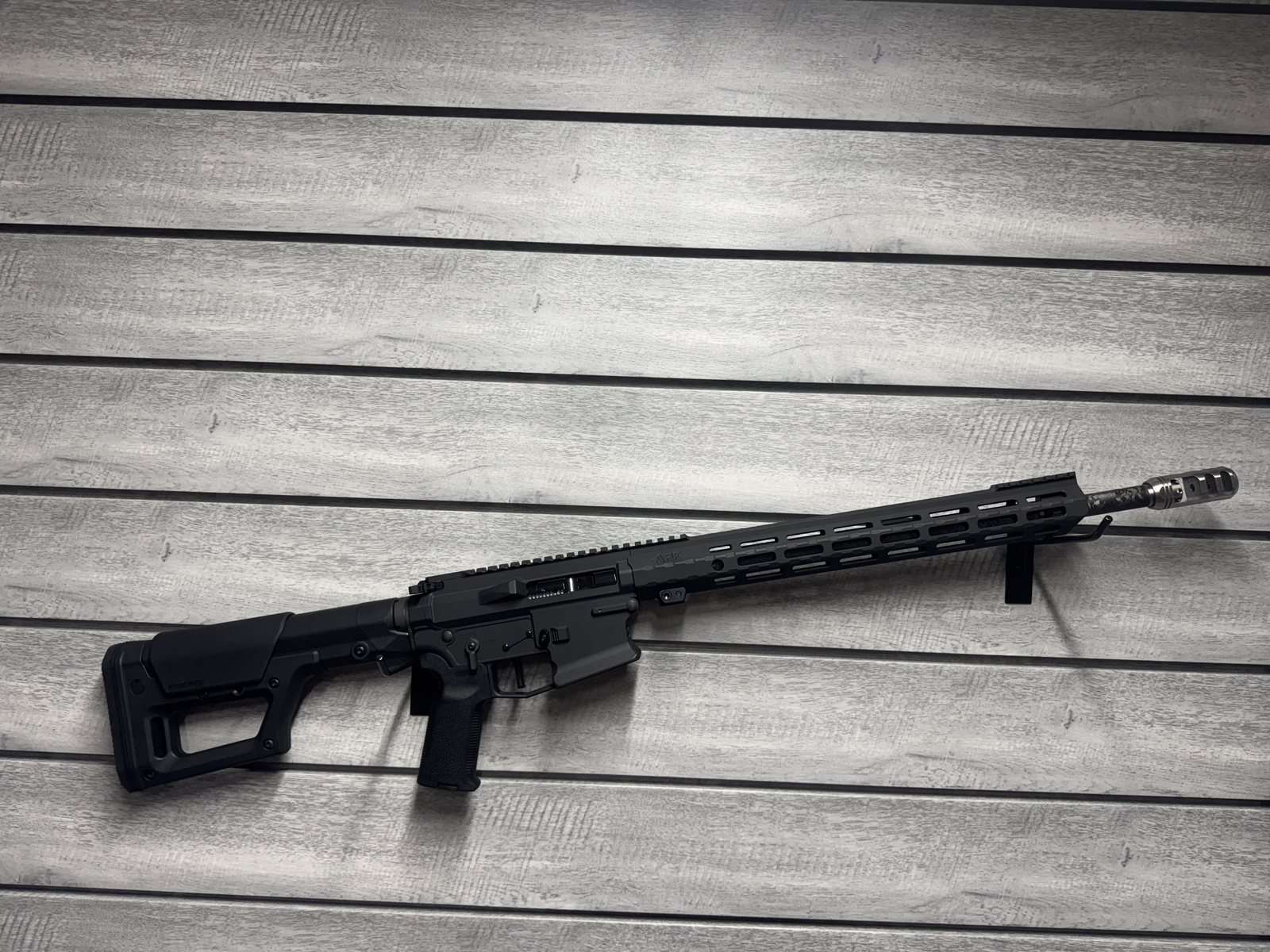 APF AR-platform rifle, black, M-LOK handguard, angled view